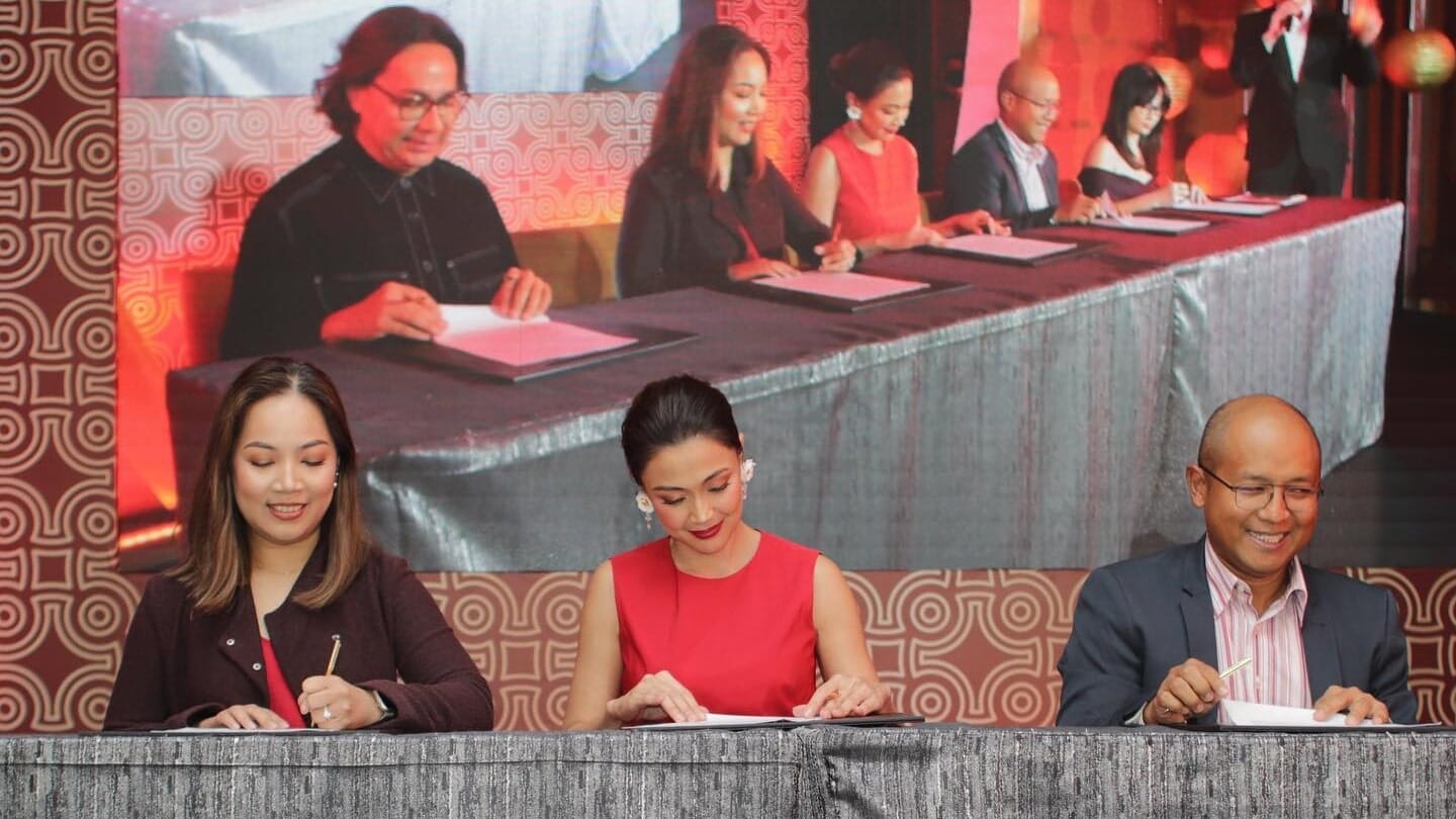 Contract signing between Jodi Sta. Maria and Chowking Executives